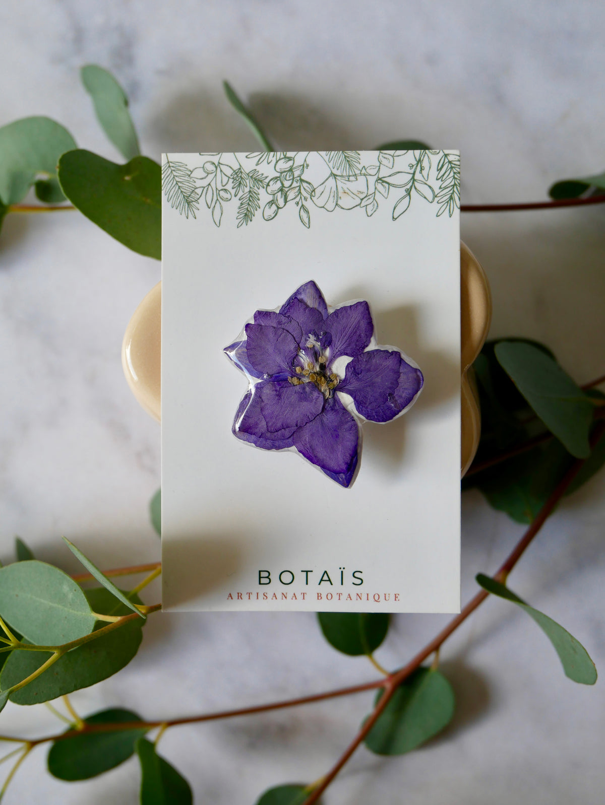Broche delphinium