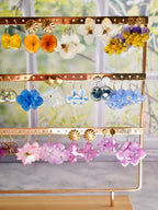 Boucles d’oreilles seringat puce